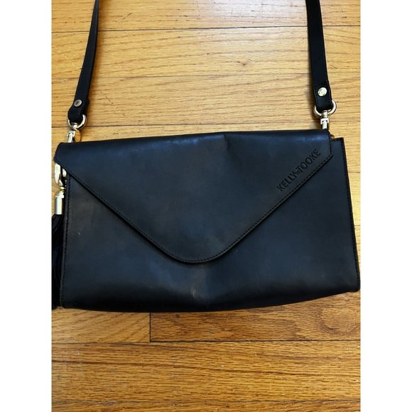 Sleek Black Crossbody Bag with Tassel Detail - Picture 2 of 9